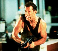 Bruce Willis as John McClane in John McTiernan Die Hard (1988)