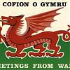 This is the Welsh flag with greetings in Welsh and English